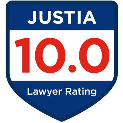 Shield-shaped badge featuring the "Justia 10.0 Lawyer Rating" prominently in red and white text against a sleek blue background.